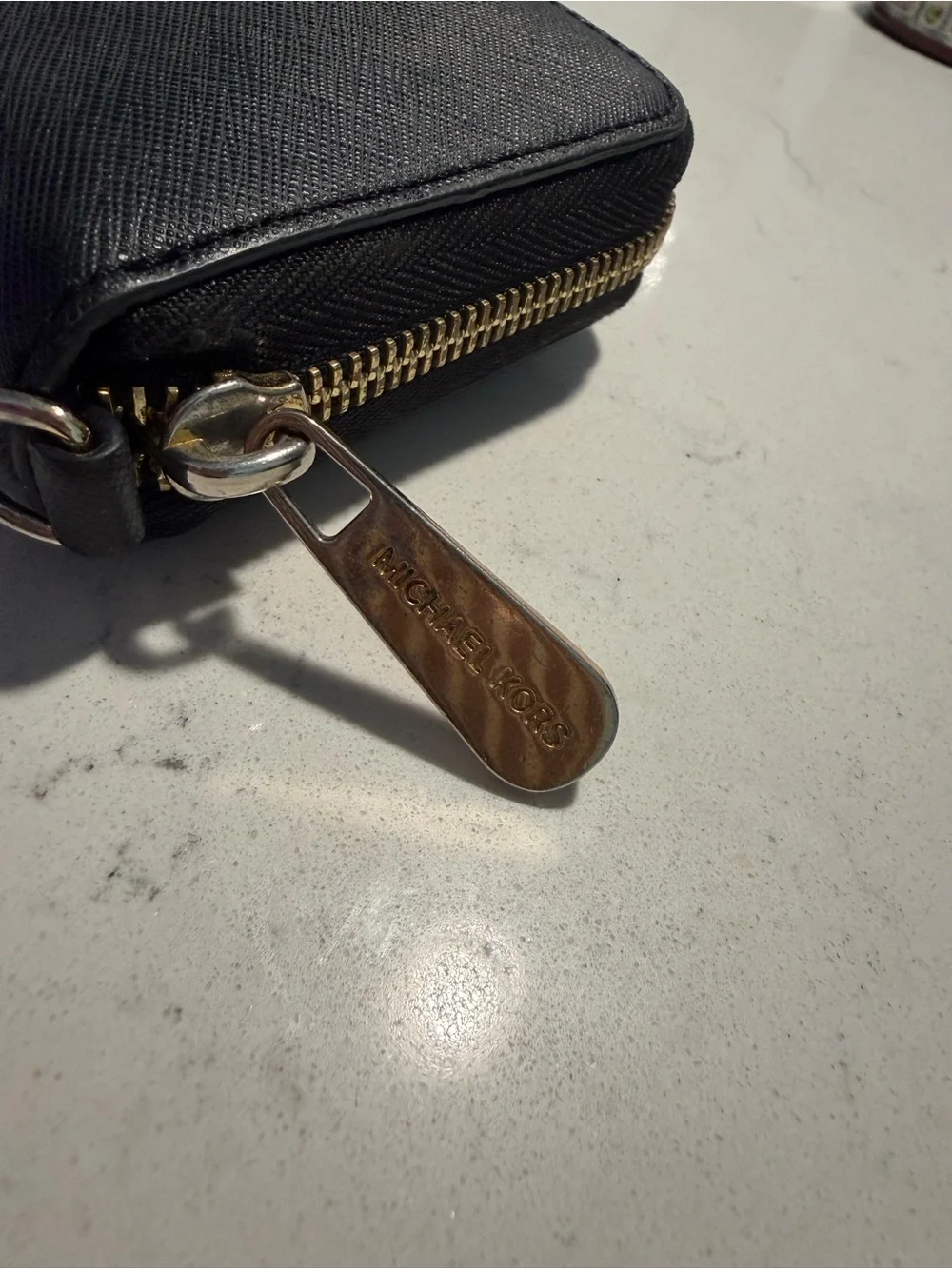 Michael Kors Black Saffiano Zip Wallet with Gold Logo